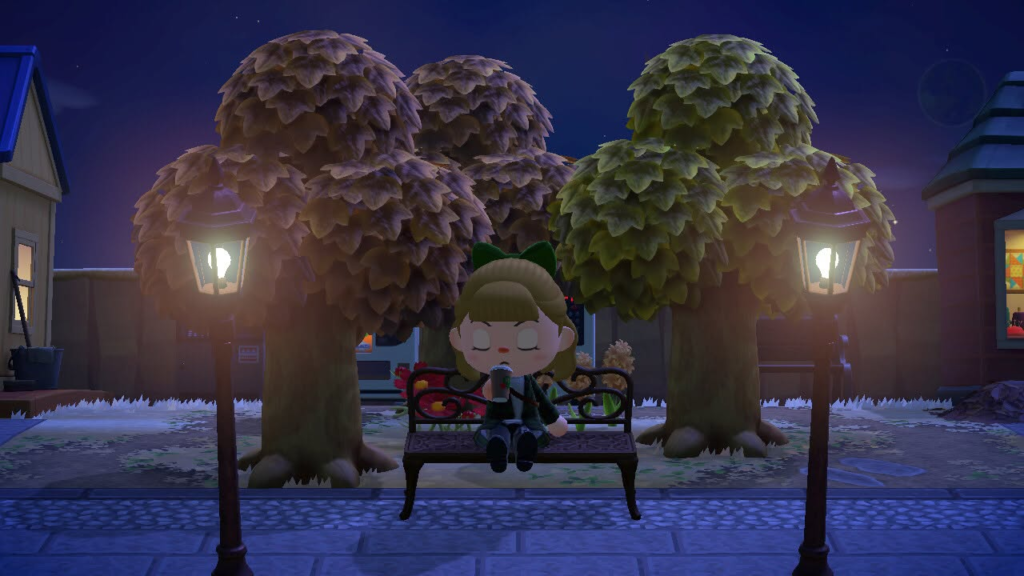 Millicent drinking coffee from Brewster at the entrance of Lunamori island.